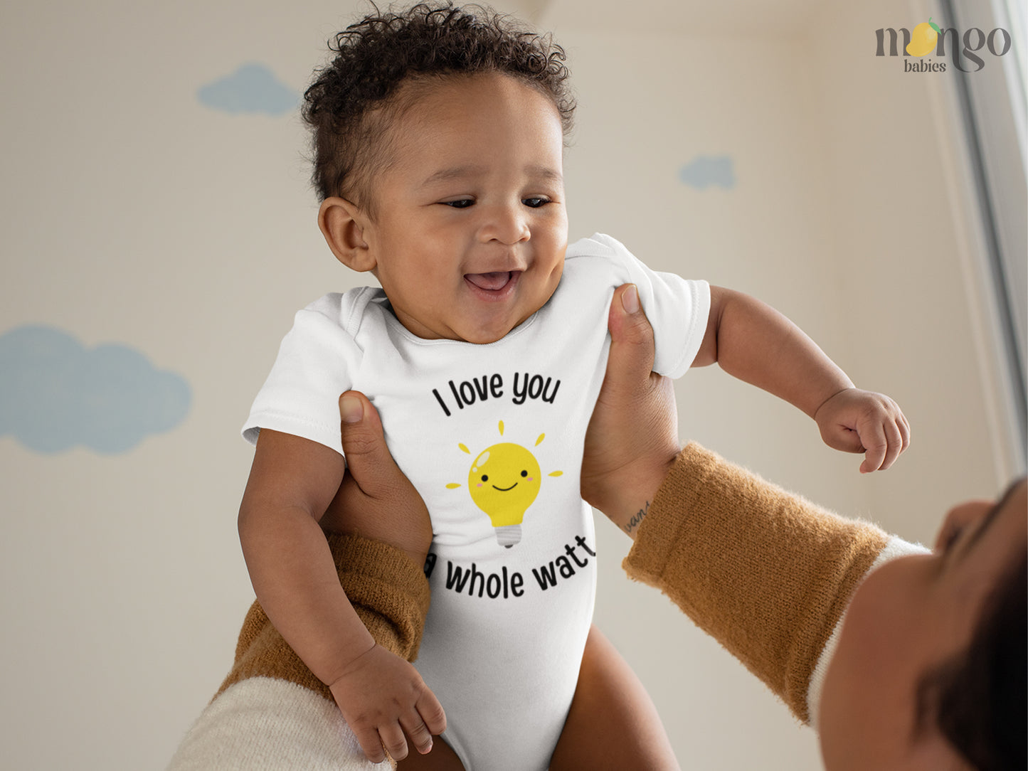 White Baby Bodysuit showcasing a playful printed graphic of a light bulb and the endearing text 'I love you a whole watt.' Discover this adorable tee that adds a touch of affection and style to your child's wardrobe