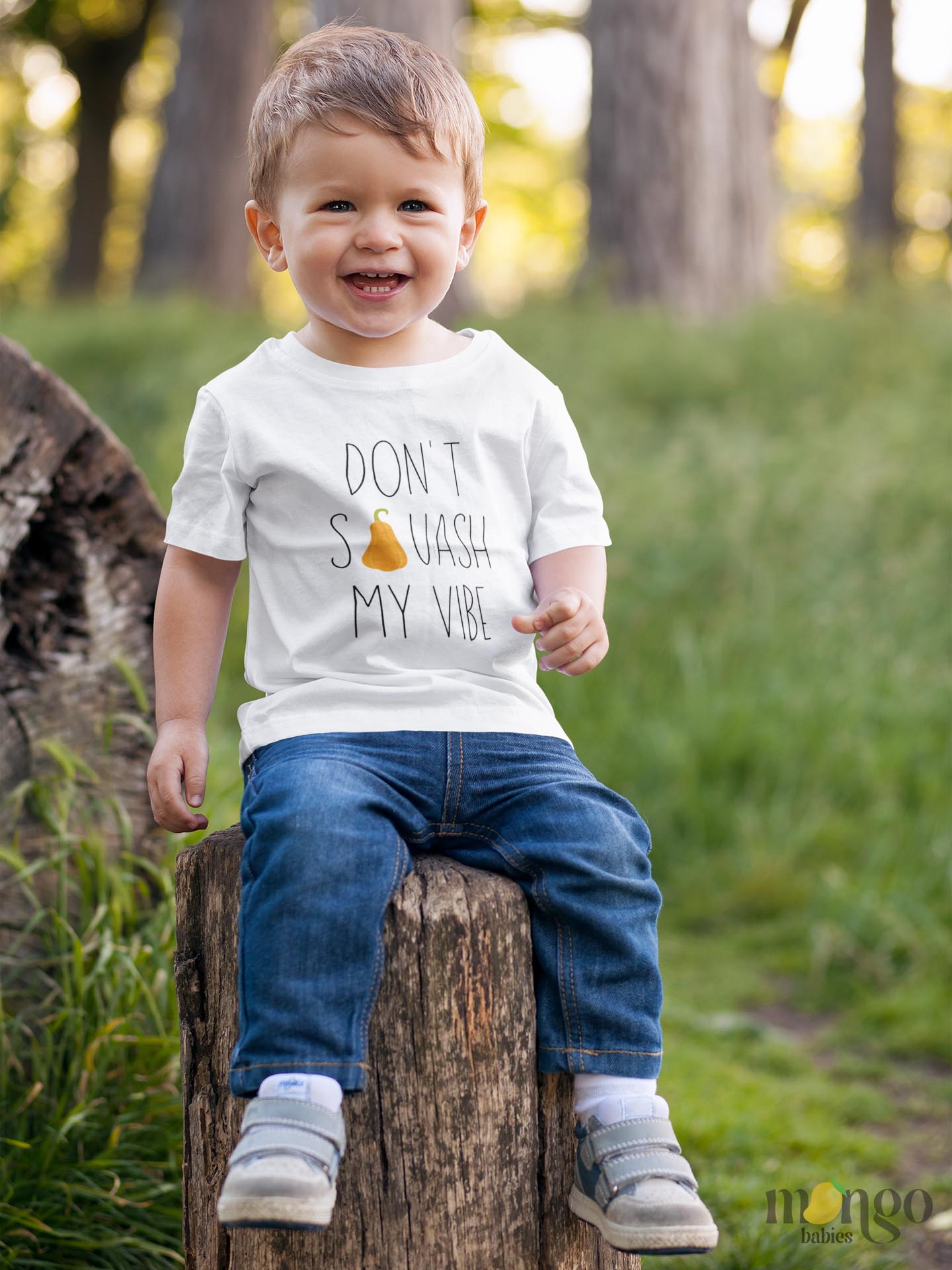 White Toddler t-shirt featuring a fall-themed printed graphic of a squash and the fun text 'Don't Squash My Vibe.' Explore this trendy tee, perfect for embracing autumn style. 