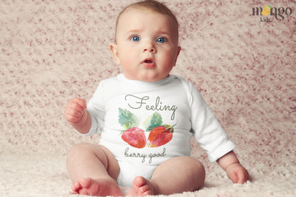 White Long Sleeve Bodysuit featuring a cute strawberry graphic and the text 'Berry Good.' Add a playful charm to your child's style with this delightful tee