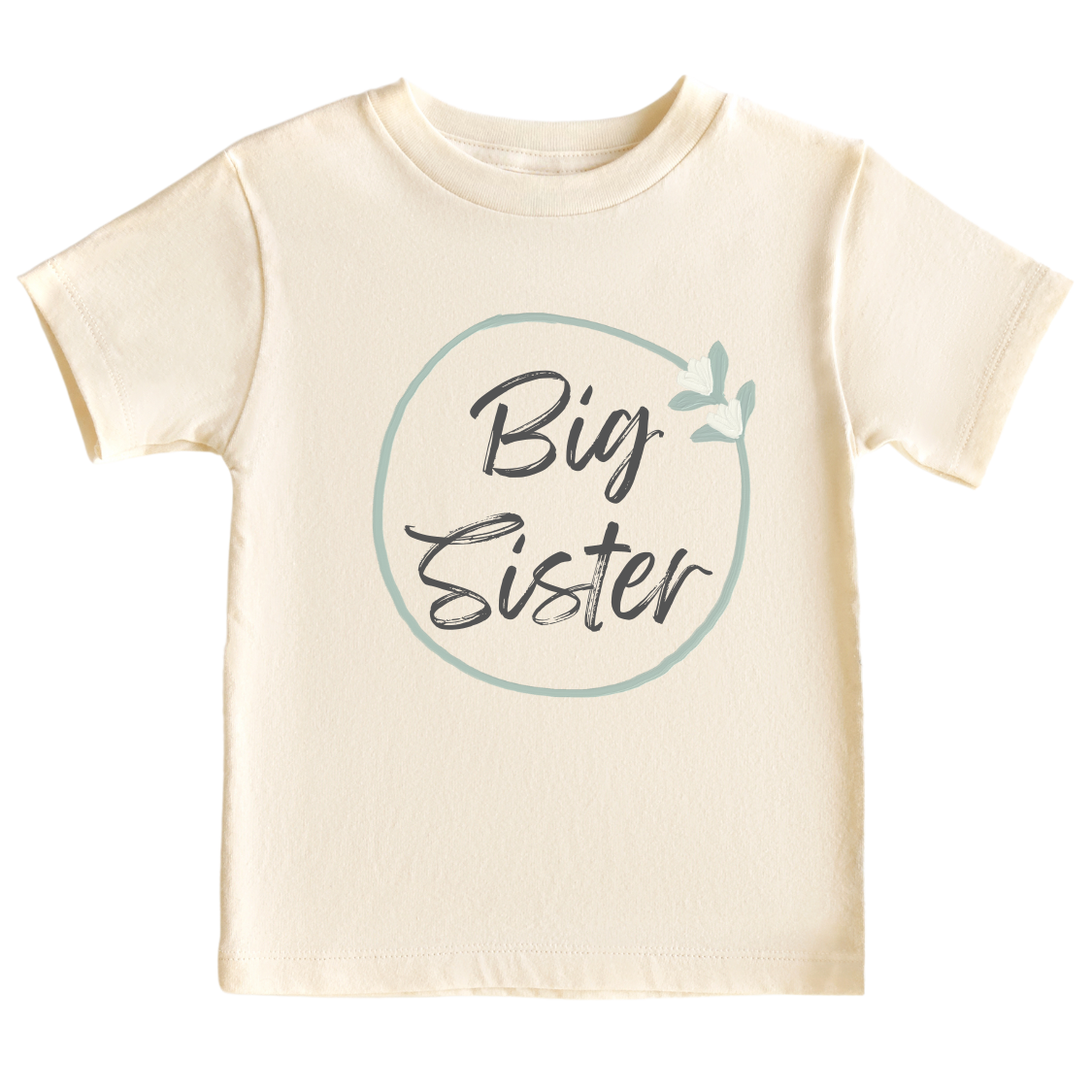 Natural kid's t-shirt with a minimalistic printed graphic of a pastel green floral wreath and the text 'Big Sister.' This delightful t-shirt celebrates the exciting role of a big sister.