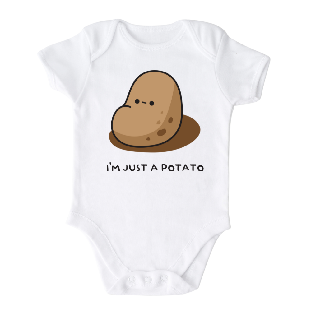 White Onesie showcasing a playful printed graphic of a potato and the text 'I'm just a potato.' Explore this adorable tee that celebrates uniqueness and humor.