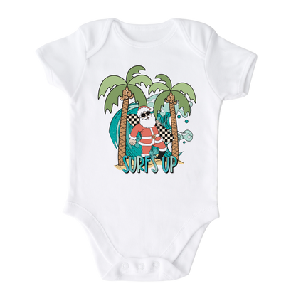 White Bodysuit with a funny Santa surfing graphic and the text 'Surf's Up' - perfect for adding some holiday cheer and beach vibes to their outfit.