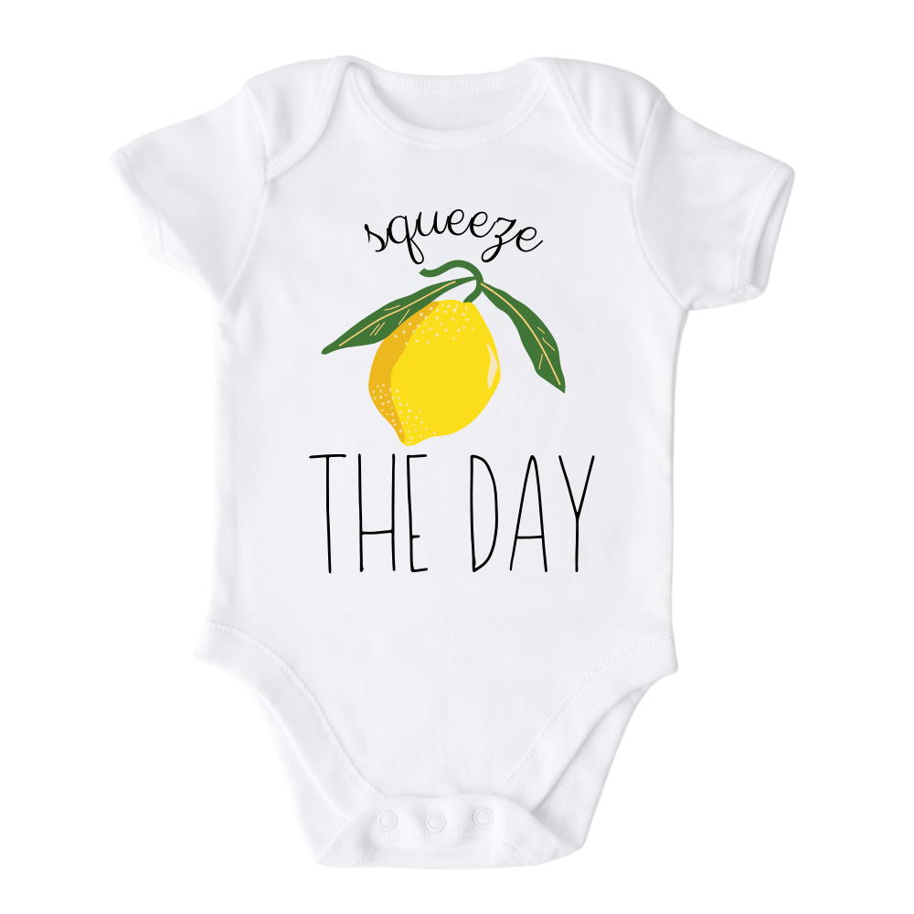 White Short Sleeve Baby Bodysuit with a cute lemon graphic and the text 'Squeeze The Day.' This vibrant design encourages seizing opportunities and embracing positivity