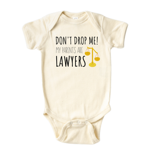 Natural Onesie - Baby Clothes with a cute printed graphic and the text 'Don't Drop Me My Parents Are Lawyers.' Discover this playful tee, perfect for children with lawyer parents or legal enthusiasts. Shop now and add a touch of humor and personality to your child's wardrobe with this captivating addition.