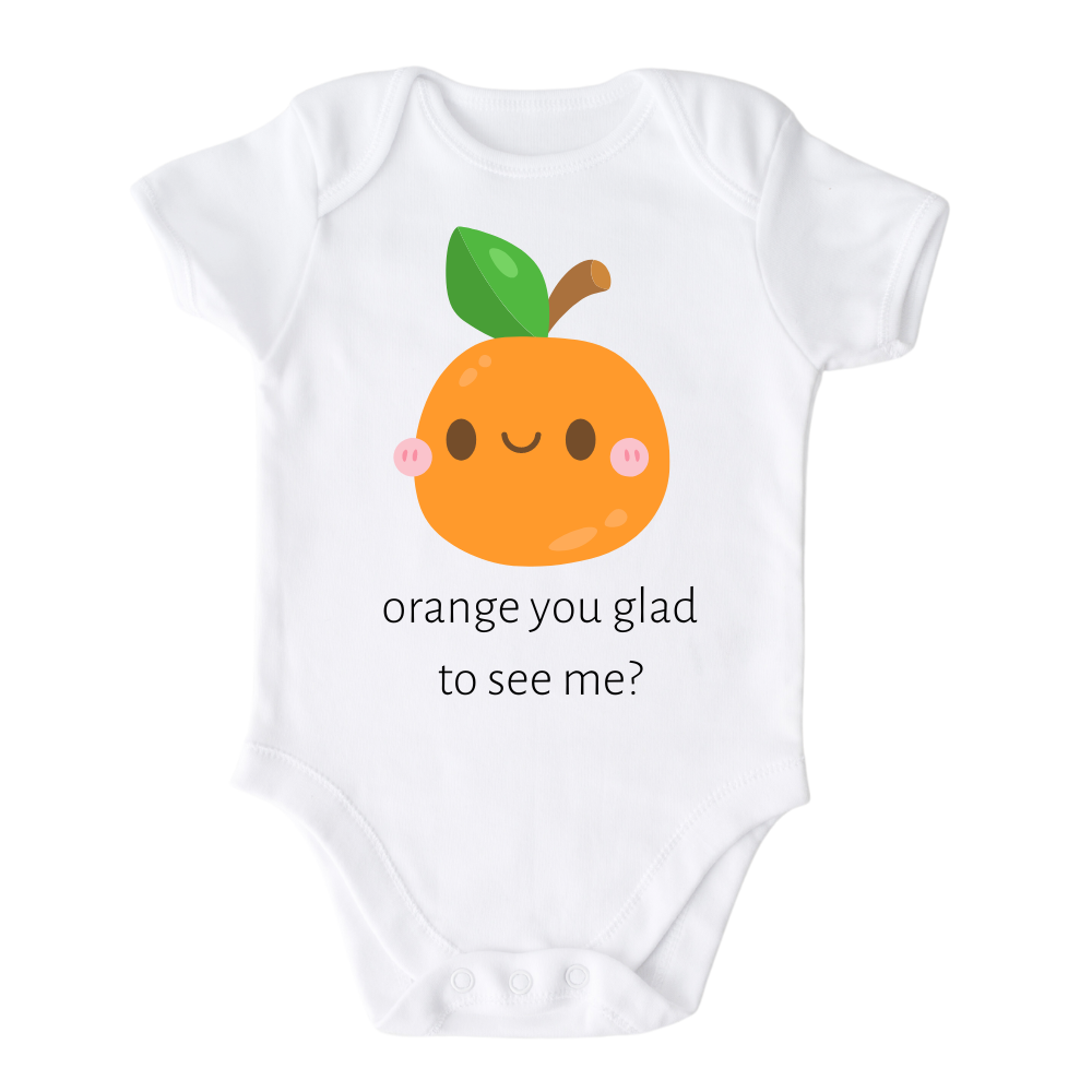 A kids' t-shirt with a charming graphic of a cute orange and the text 'Orange You Glad To See Me.' The design exudes a playful and lighthearted vibe, encouraging positivity and cheerful interactions. It's a delightful and expressive tee that brings joy to those who see it.