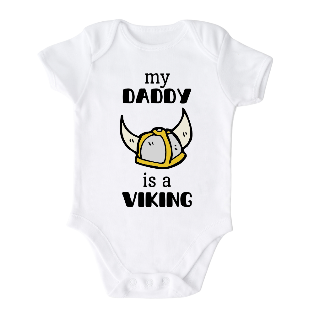 White Onesie with a printed graphic of the text 'My daddy is a viking.' This playful design celebrates the strong bond between a child and their Viking dad.