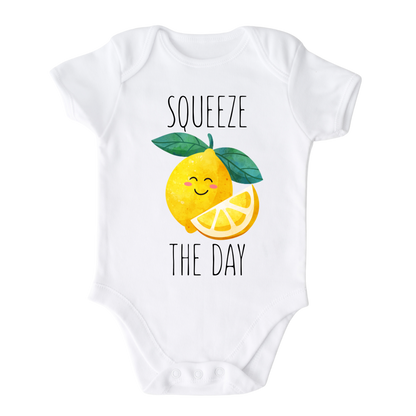 Baby Onesie showcasing a playful printed graphic of a lemon with the text 'Squeeze The Day.' Explore this vibrant and motivational tee, perfect for adding a burst of positivity to your child's wardrobe.