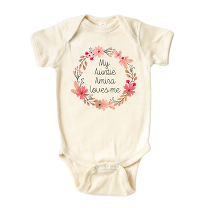 Natural Baby Onesie featuring a floral wreath design and customizable text 'My Auntie Loves Me.