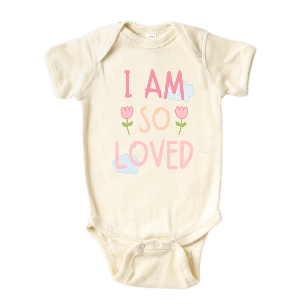 Natural Onesie with a pastel graphic of the text 'I am so loved.' This heartwarming design represents the unconditional love surrounding your child. 