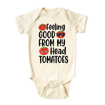 natural short sleeve baby onesie with cute tomatoes and the text 'Feeling Good From My Head Tomatoes.' This playful design adds a fun and cheerful touch to their outfit. 
