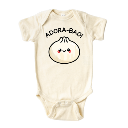A kids' t-shirt with a lovable graphic of a cute bun and the text 'Adorabao.' The design captures the essence of irresistible charm and showcases the wearer's adorable nature. It's a whimsical and stylish tee that brings a smile to everyone's face.