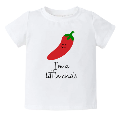Kid's t-shirt featuring a playful printed graphic of a chili and the text 'I'm A Little Chili.' Explore this vibrant and fun tee, perfect for adding a touch of spice to your child's wardrobe. 