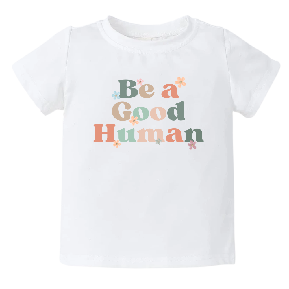 Kids t-shirt with retro printed graphic of 'Be A Good Human' text, promoting kindness and positivity. Shop now and inspire your little one to make a positive impact. Perfect addition to their stylish wardrobe.