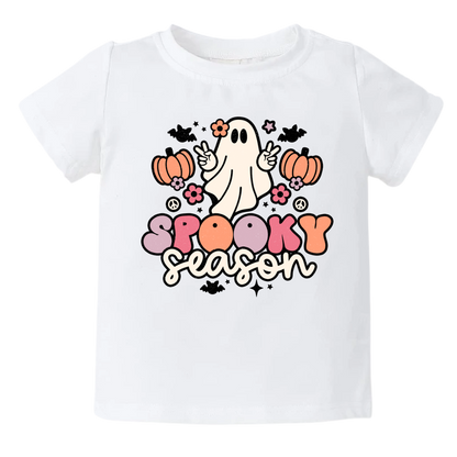 Kids' t-shirt with a cute ghost graphic and the text 'Spooky Season.' Perfect for Halloween outfits and festivities. Shop now and let your little one embrace the spirit of Halloween with this fun and festive tee!