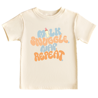 Natural Kid Tshirt with a fun printed graphic and the text 'Milk Snuggle Nap Repeat.' This playful and cute design captures the essence of cozy and comforting moments. 