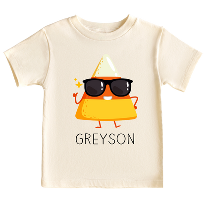 A charming candy corn design on a kid's t-shirt and baby onesie, perfect for Halloween celebrations. The design can be personalized with customizable names, adding a delightful touch to the spooky festivities.