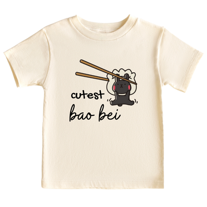 A kids' t-shirt with a cute Bao Rabbit graphic and the words 'Cutest Bao Bei'. This playful and stylish shirt is soft and comfortable, perfect for little ones to showcase their adorable charm and embrace imaginative adventures.