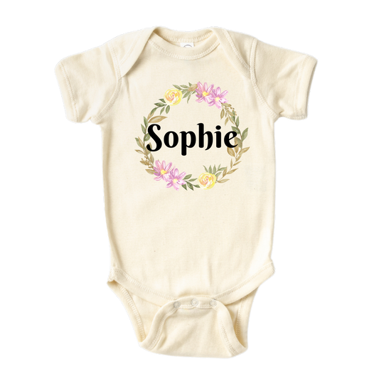 Kid's t-shirt with a cute flower wreath design, customizable with names.