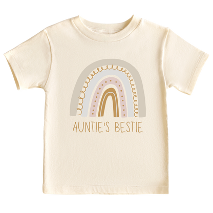 A colorful kid's t-shirt adorned with a delightful printed graphic of a radiant rainbow and the text 'Auntie's Bestie.' This charming tee celebrates the cherished bond between a beloved aunt and her adored niece or nephew.