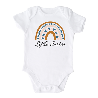 Baby Onesie with a boho printed graphic of a colorful rainbow and the text 'Little Sister.' This enchanting t-shirt celebrates the arrival of a precious little sister.