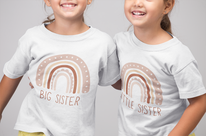 Kid's t-shirt with a cute printed design of a rainbow, customizable with the text 'Little Sister'.