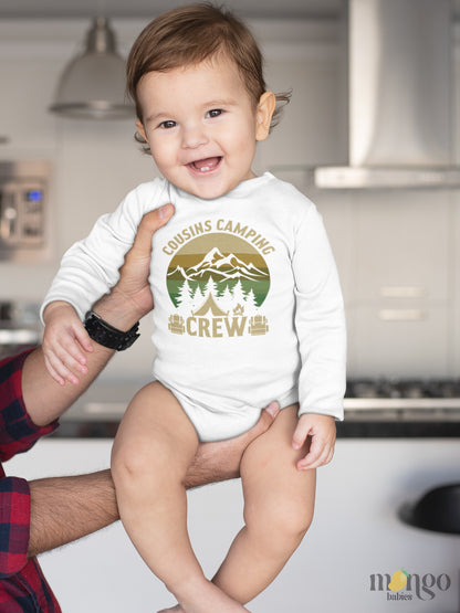 Long Sleeve Baby Bodysuit with a camping-themed printed graphic and the text 'Camping Cousin Crew.' This adventurous design celebrates the bond of cousins on camping trips. 