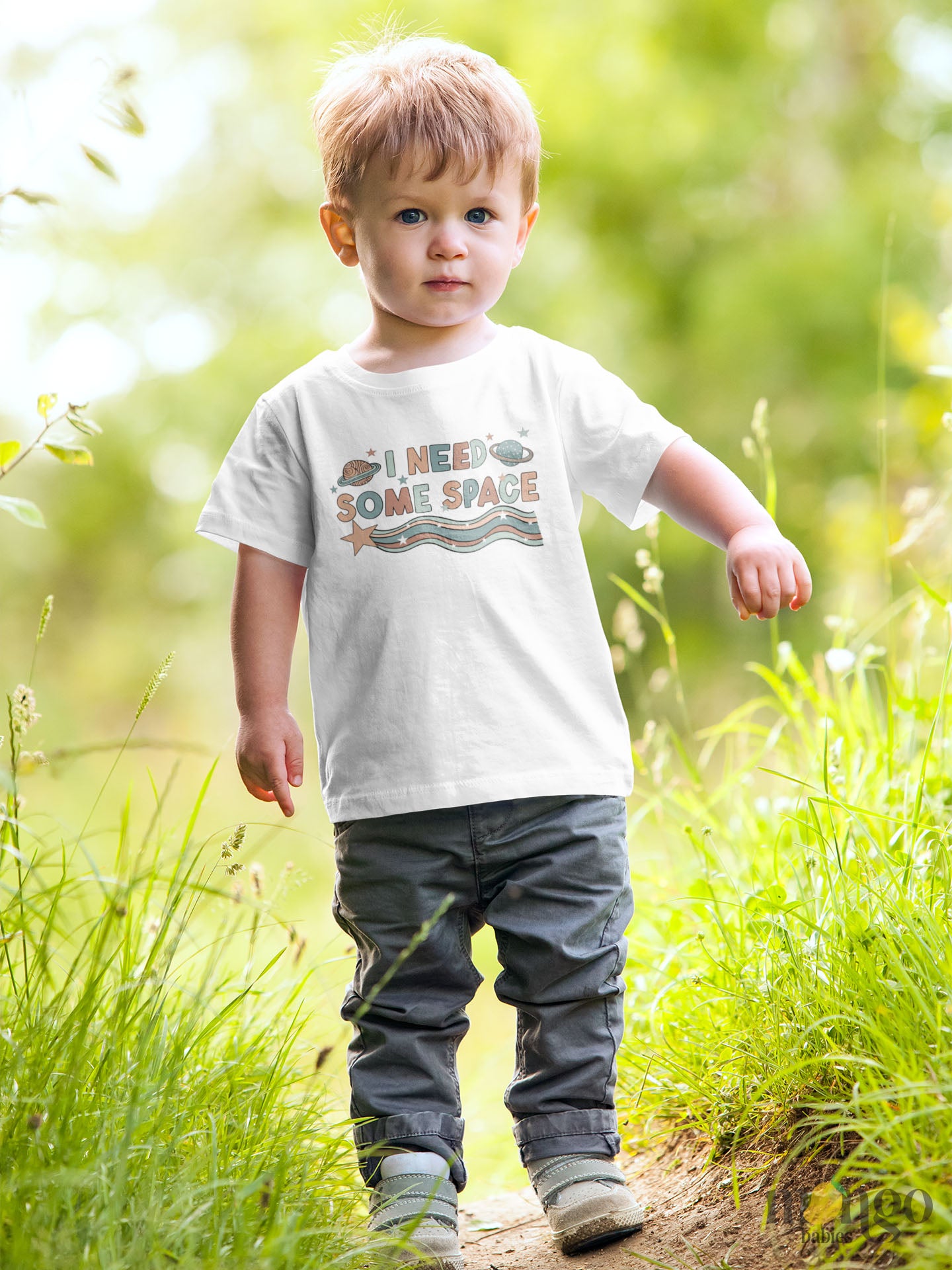 Kids t-shirt with cute space graphic and the text 'I Need Some Space.' Perfect for space enthusiasts and young explorers.